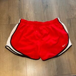 Red Nike shorts